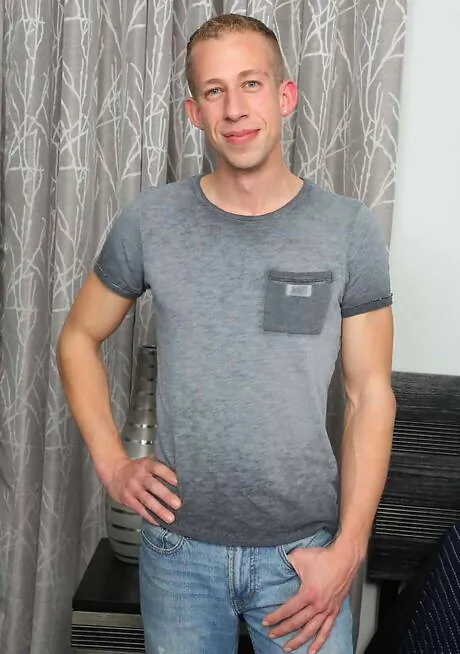 Muscular Johnny Cohen undressing and showing his ass