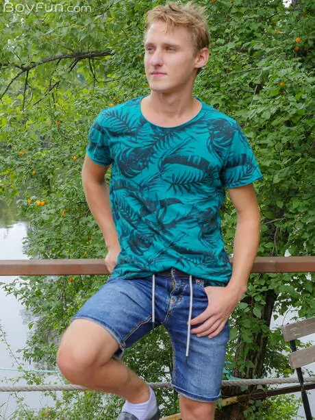 Young Oliver Morgenson posing naked and showing hot butt outdoor