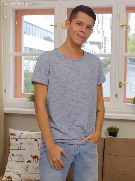 Young Andy Reyes posing nude and showing tight butt